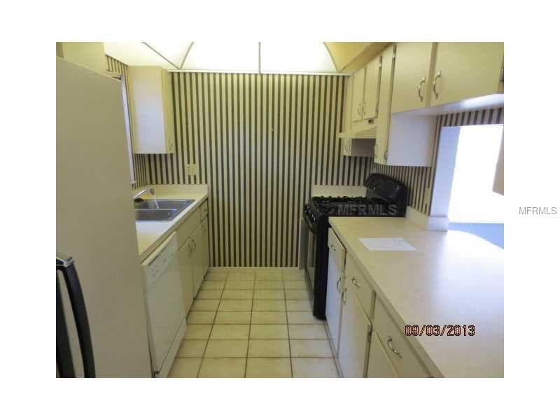 5009 VILLAGE GARDENS DRIVE — photo 3 of 10