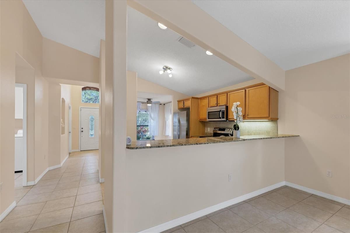 11907 DE LEON DRIVE — photo 11 of 29
