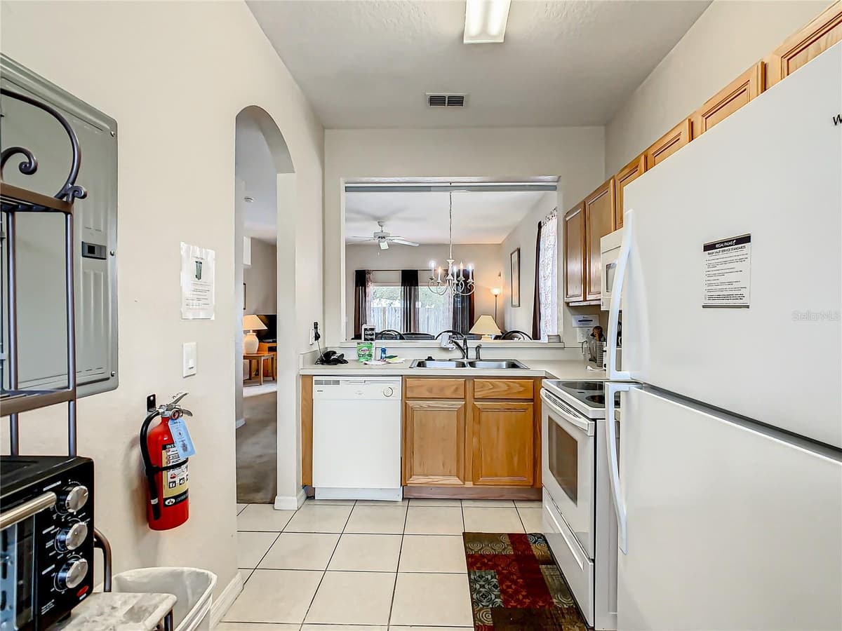 702 CALABRIA AVE — photo 7 of 58