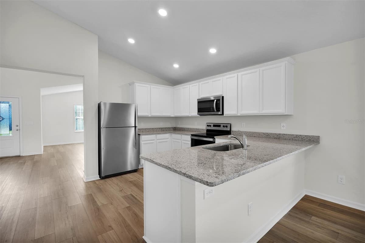 418 MARION OAKS LANE — photo 8 of 20