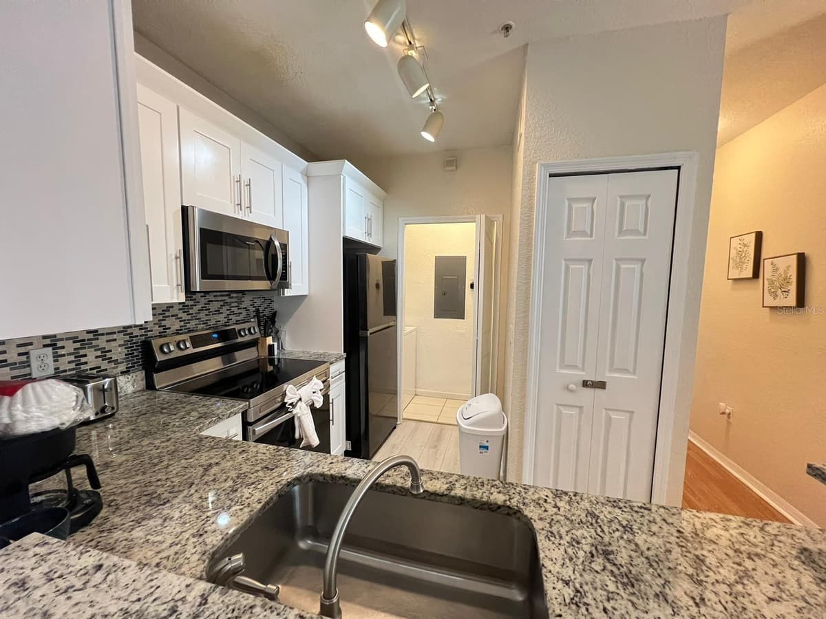 8826 DUNES COURT — photo 7 of 17