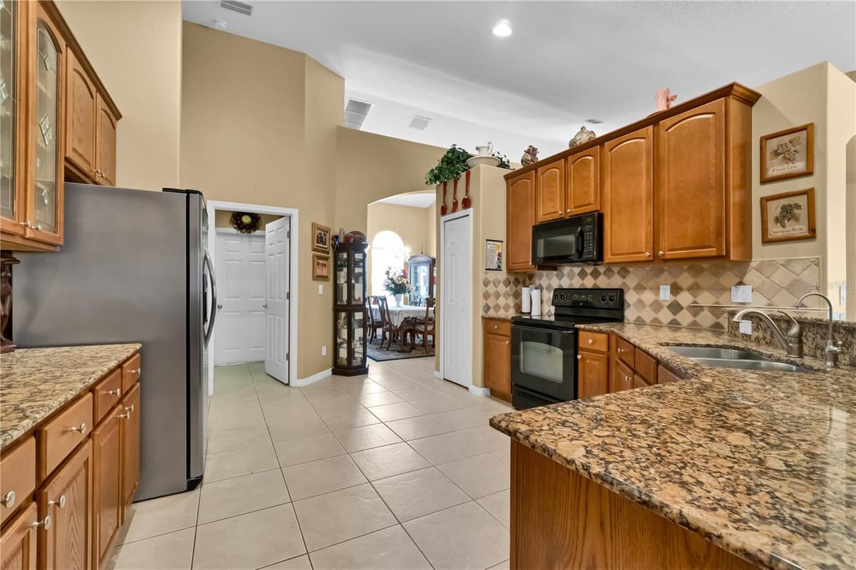 13144 COLDWATER LOOP — photo 11 of 52