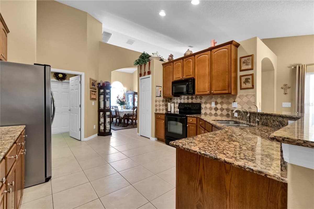 13144 COLDWATER LOOP — photo 12 of 52