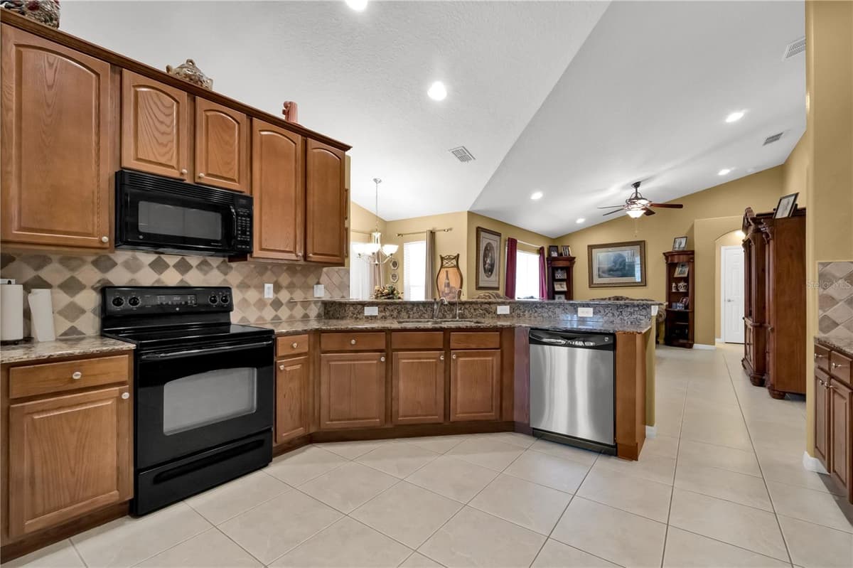13144 COLDWATER LOOP — photo 9 of 52