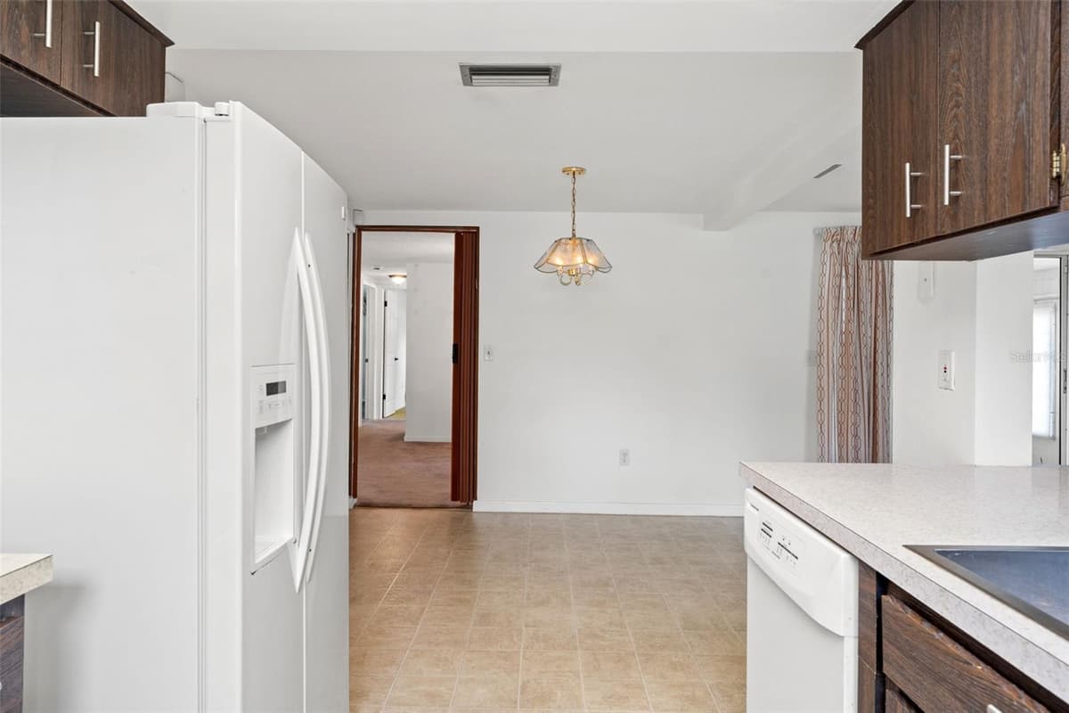 7015 FLAGGLER DRIVE — photo 12 of 33