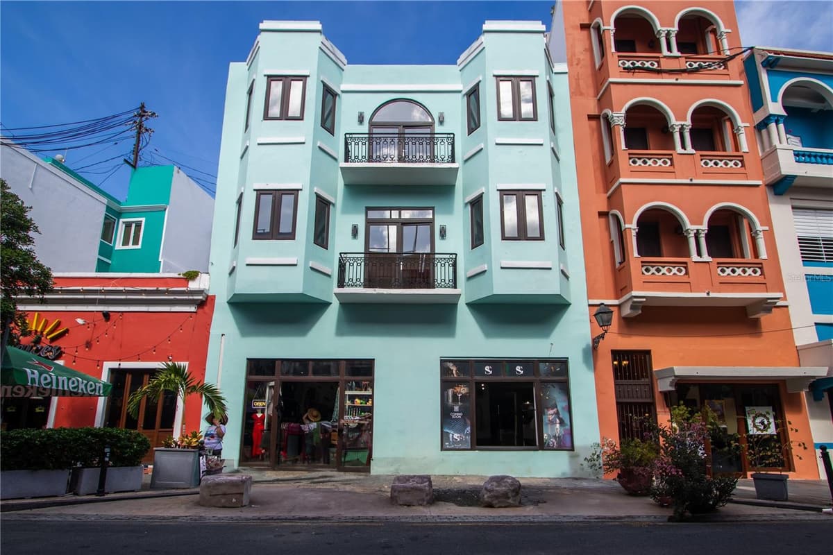 319 RECINTO SUR STREET — photo 1 of 12