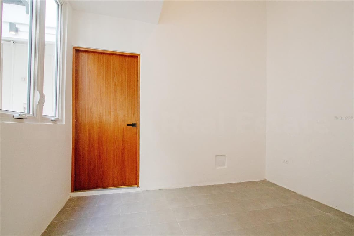 319 RECINTO SUR STREET — photo 7 of 12
