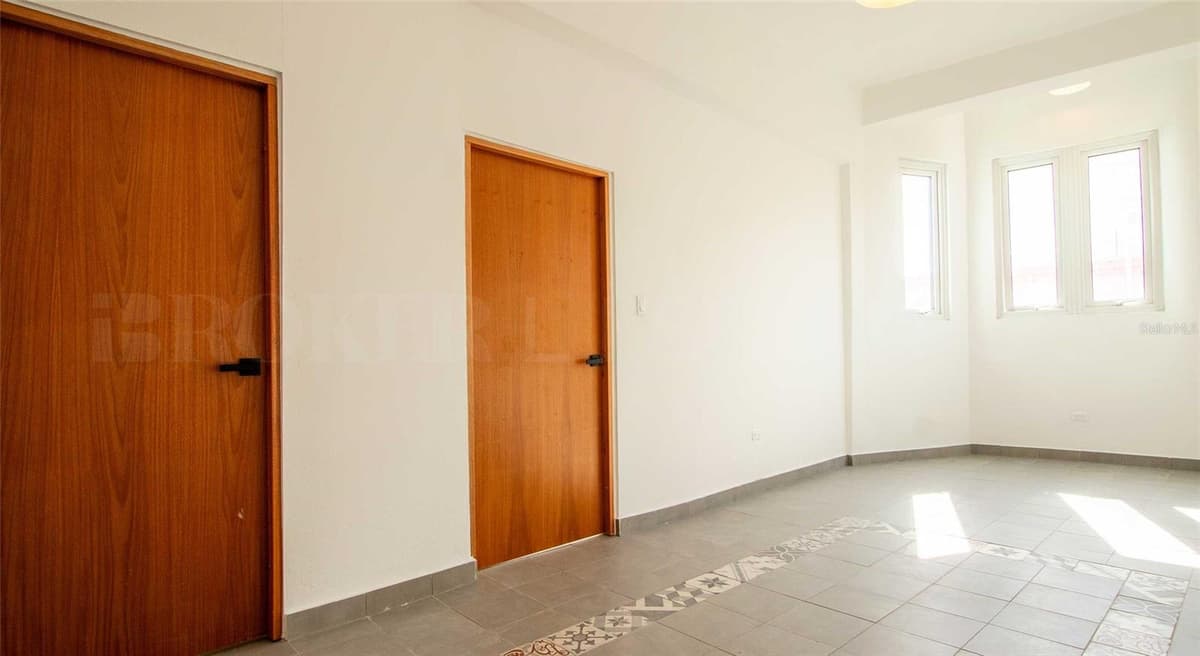 319 RECINTO SUR STREET — photo 12 of 15