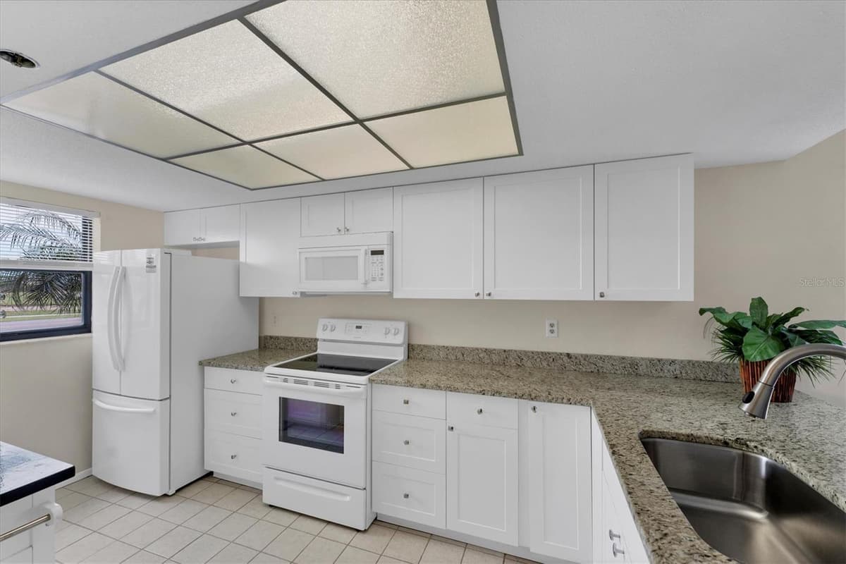 104 CAPRI ISLES BOULEVARD — photo 10 of 43
