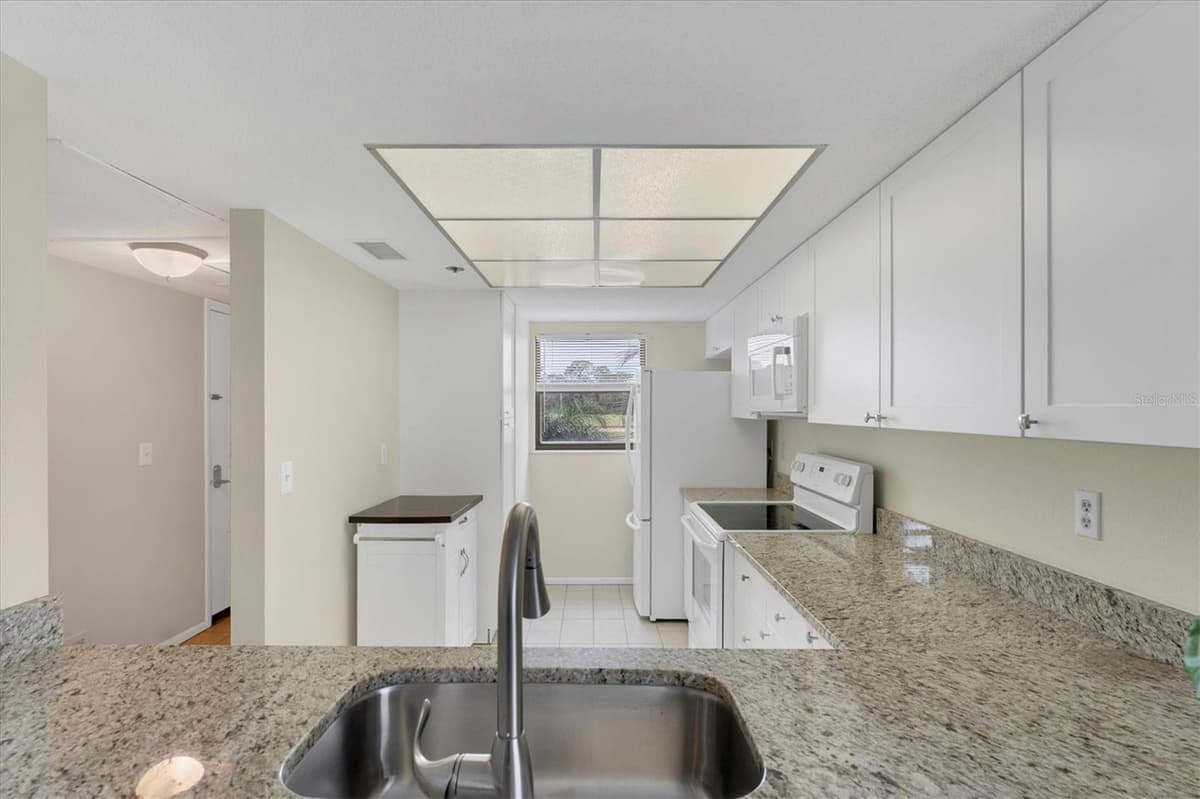 104 CAPRI ISLES BOULEVARD — photo 9 of 43