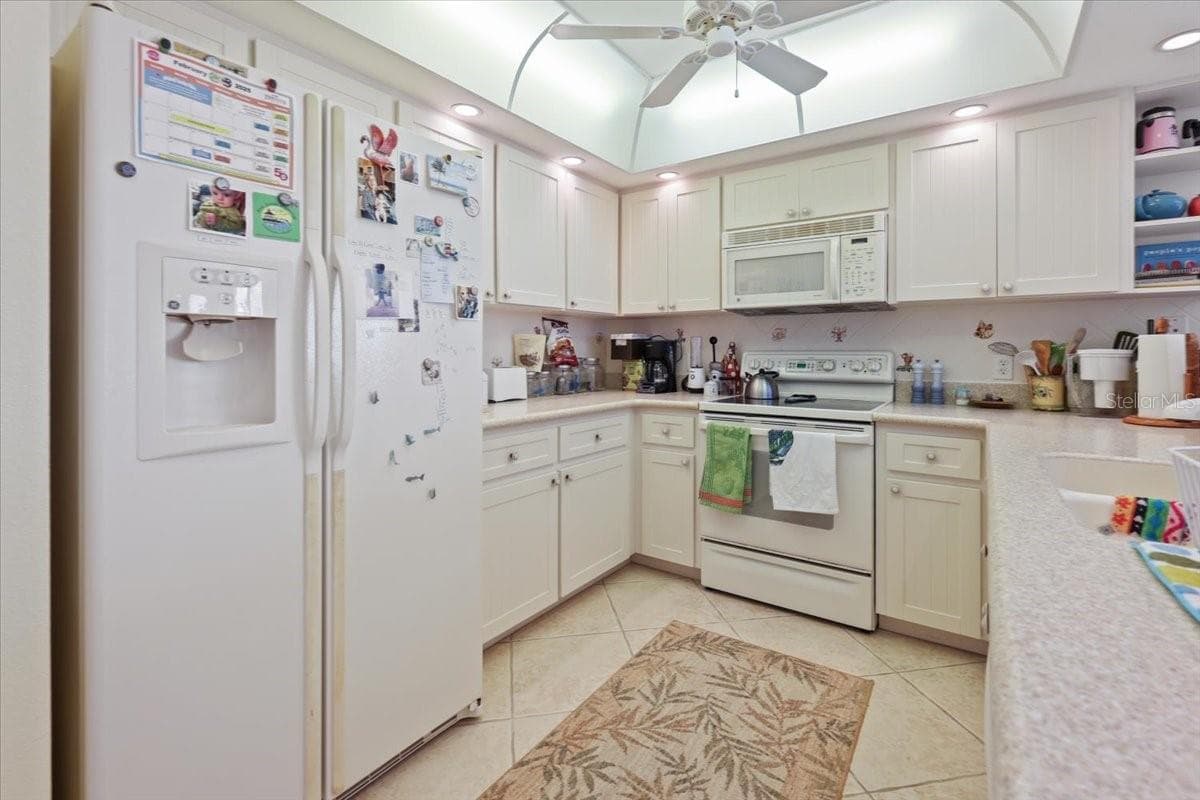 7237 RUM BAY DRIVE — photo 11 of 64