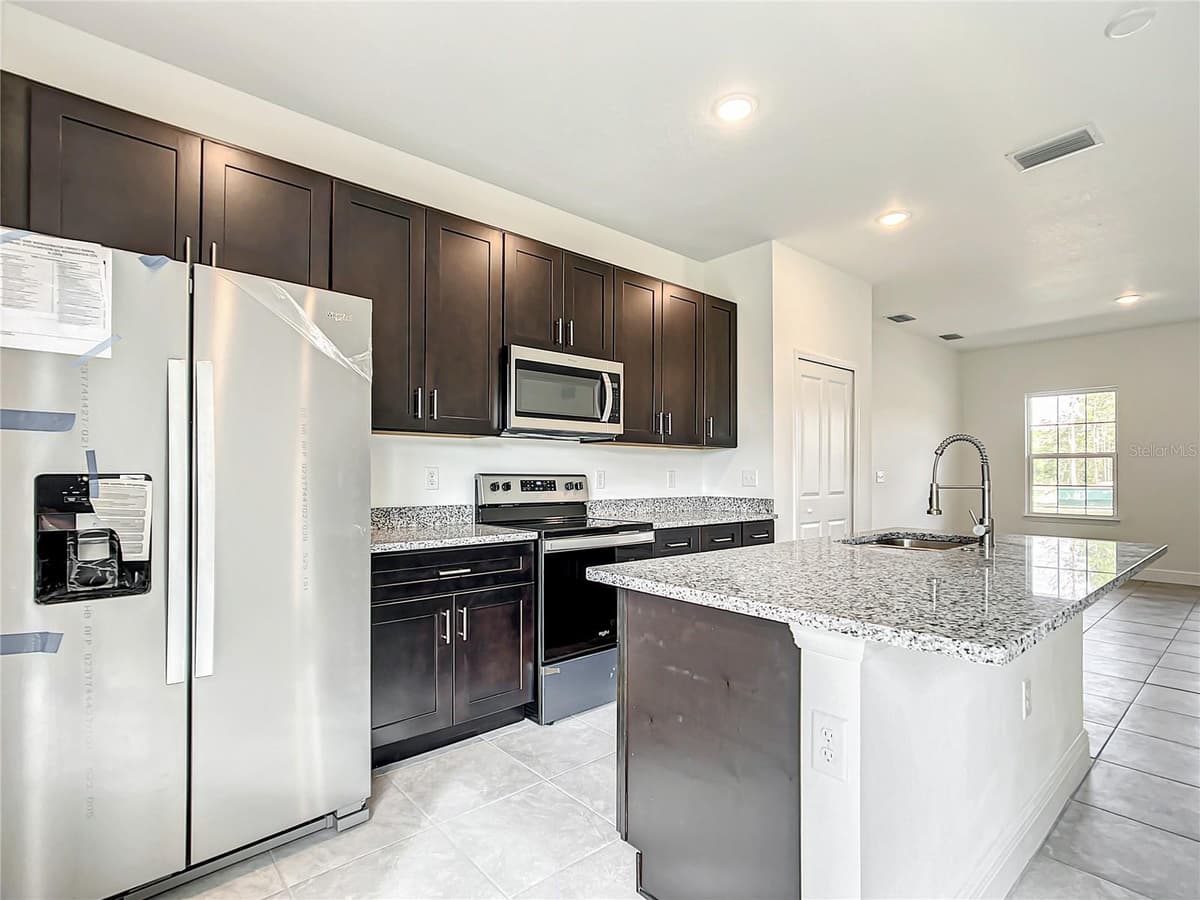 406 MARION OAKS TRAIL — photo 10 of 55