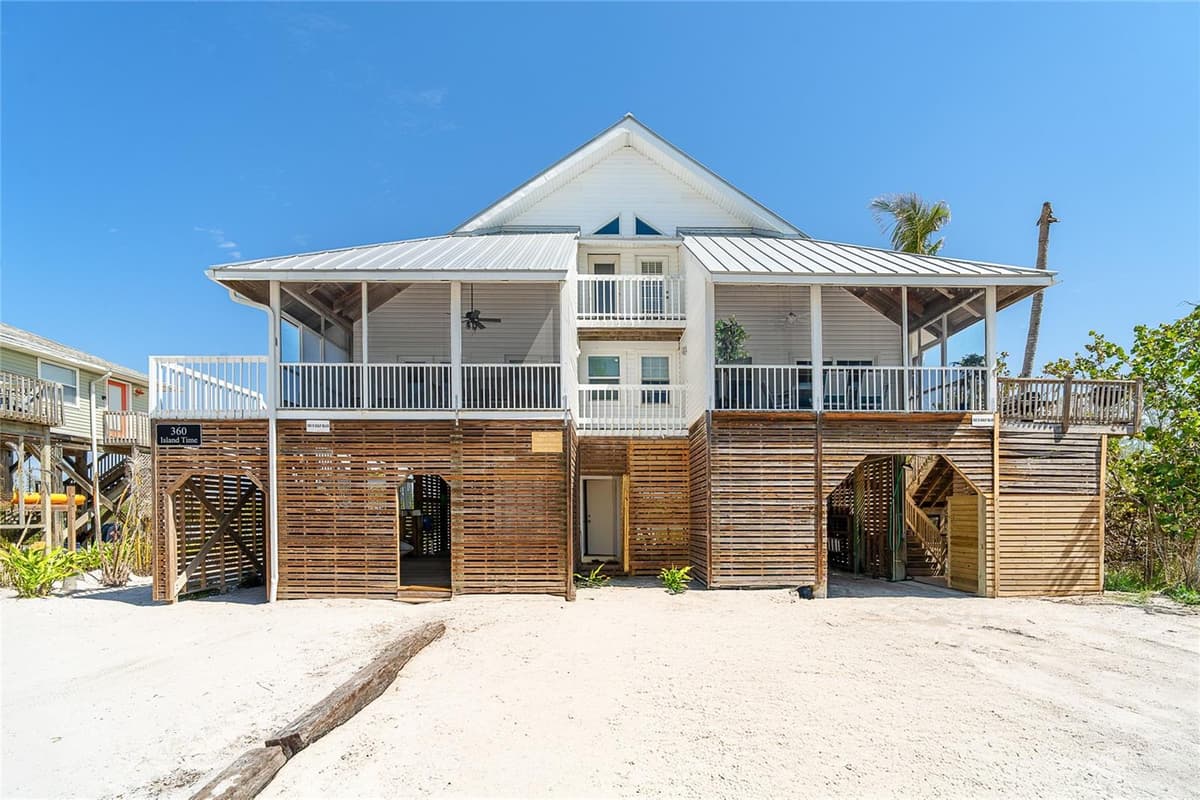 360 GULF BOULEVARD — photo 1 of 64