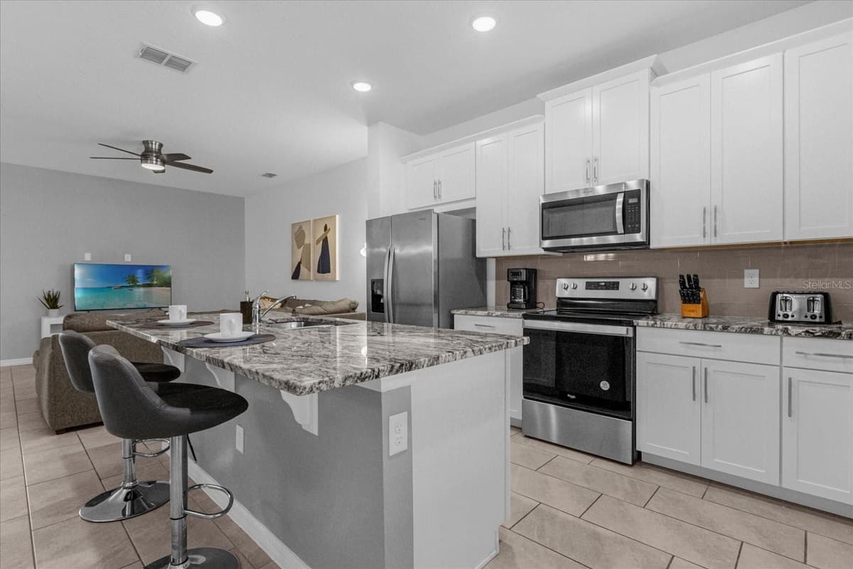 1644 TROPICAL PALMS CIRCLE — photo 3 of 46