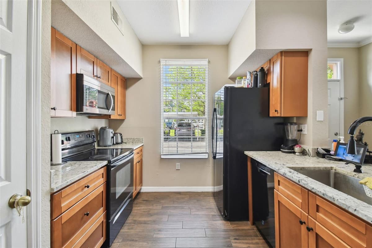 9740 LAKE CHASE ISLAND WAY — photo 10 of 44