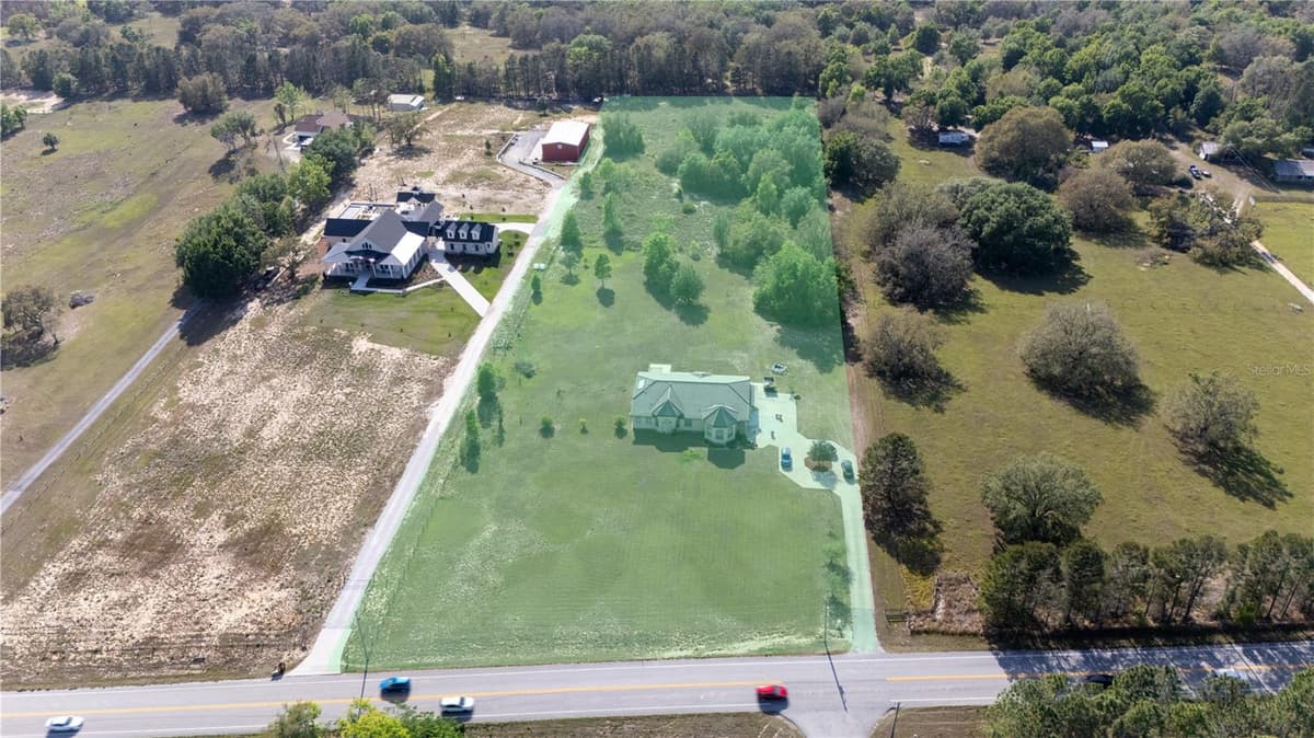 20951 COUNTY ROAD 561 — photo 3 of 65