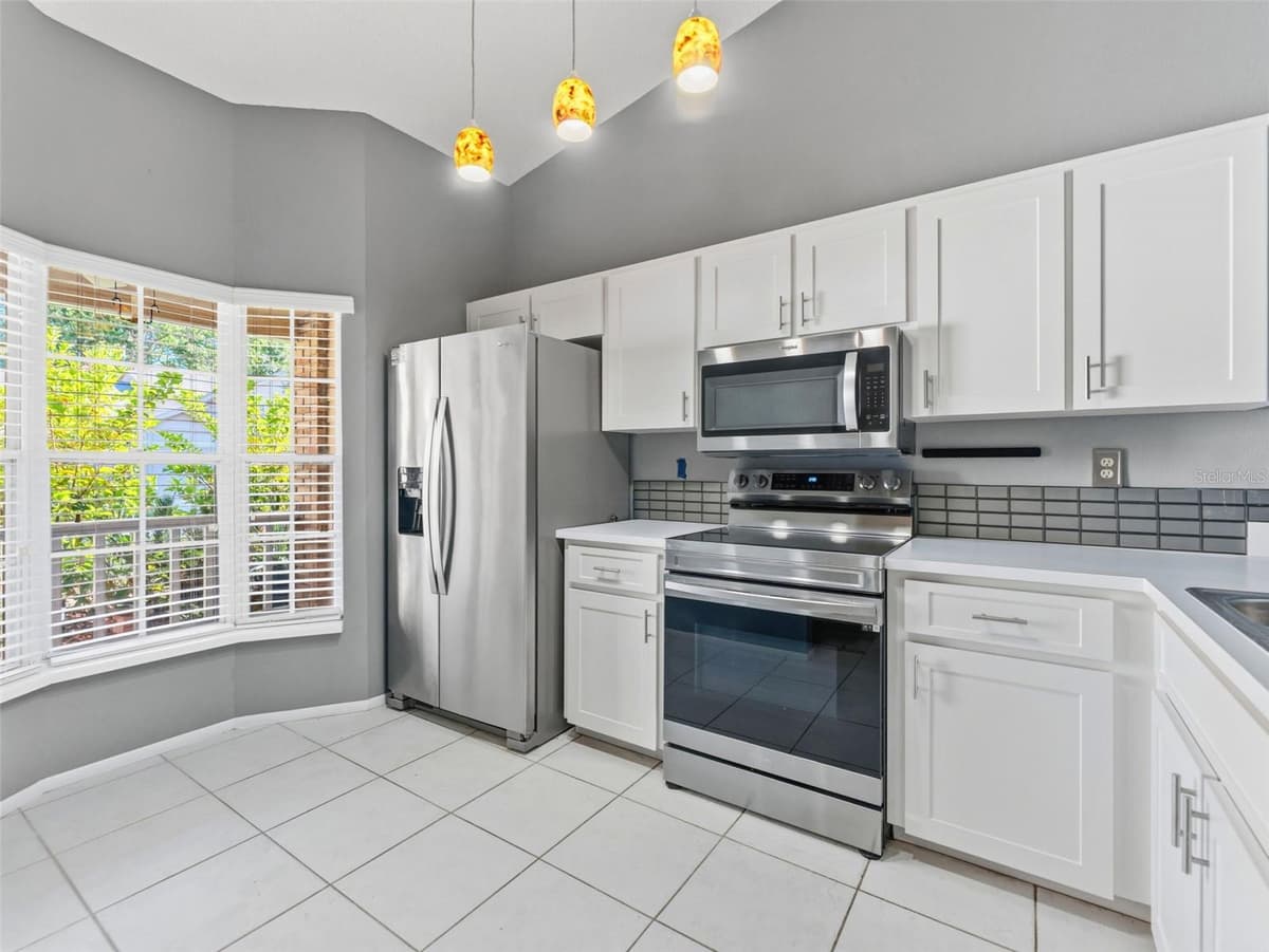 6516 REMUS DRIVE — photo 6 of 34
