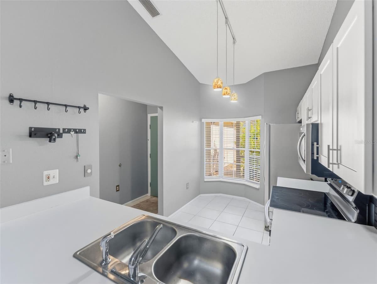 6516 REMUS DRIVE — photo 9 of 34