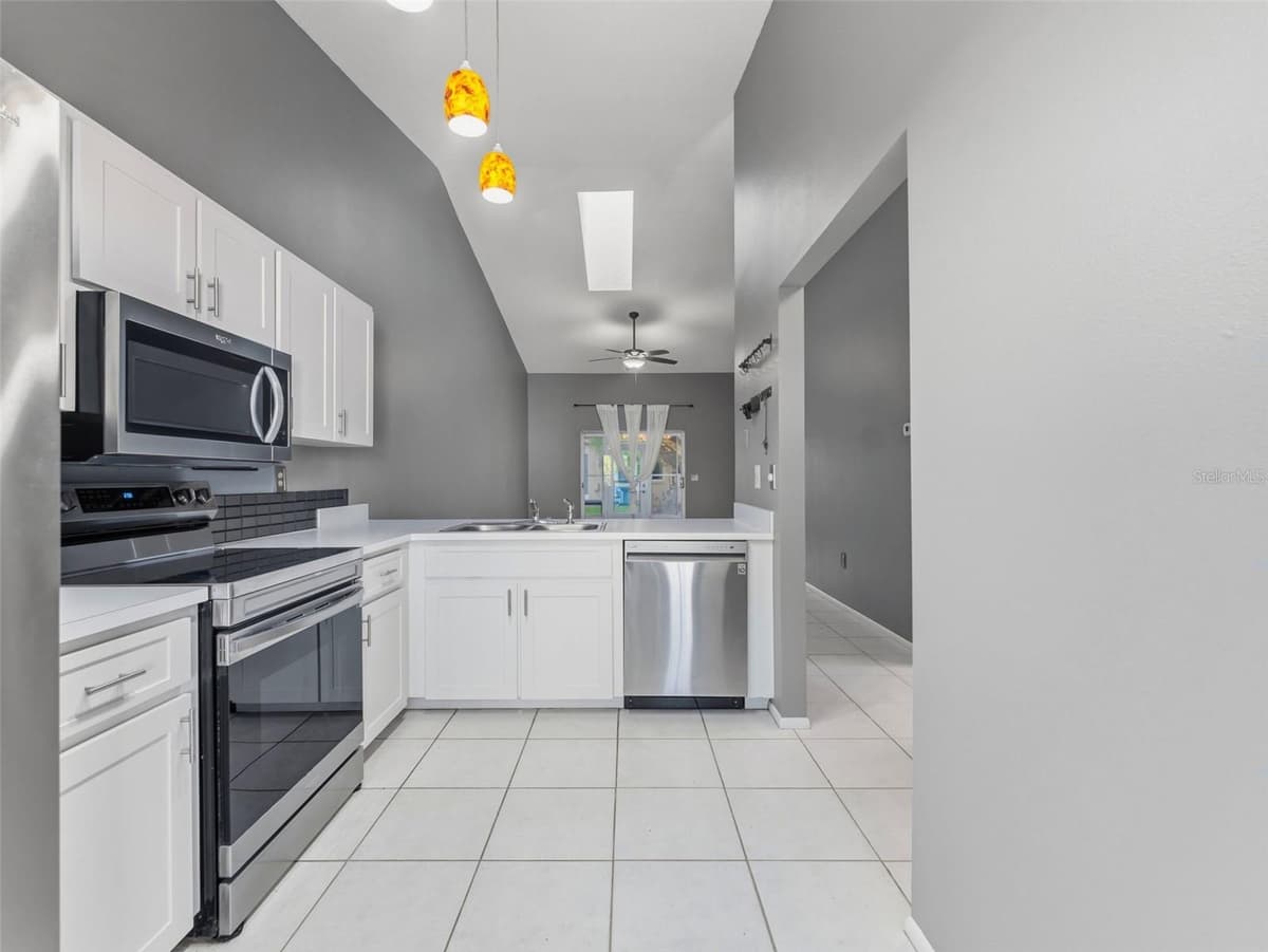 6516 REMUS DRIVE — photo 7 of 34