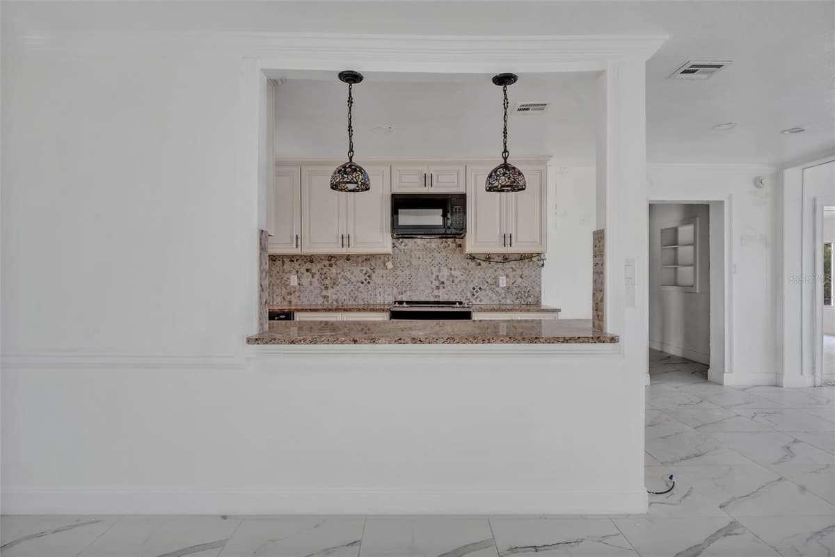 7420 LAKE WILLIS DRIVE — photo 9 of 41