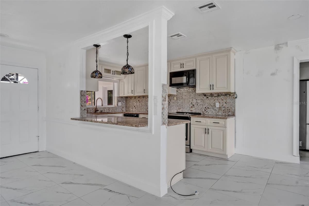 7420 LAKE WILLIS DRIVE — photo 10 of 41