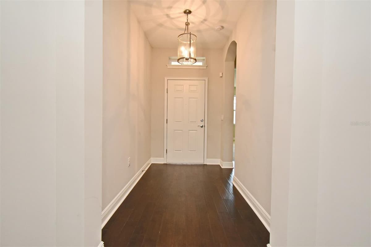 8742 PEACHTREE PARK CT — photo 3 of 38