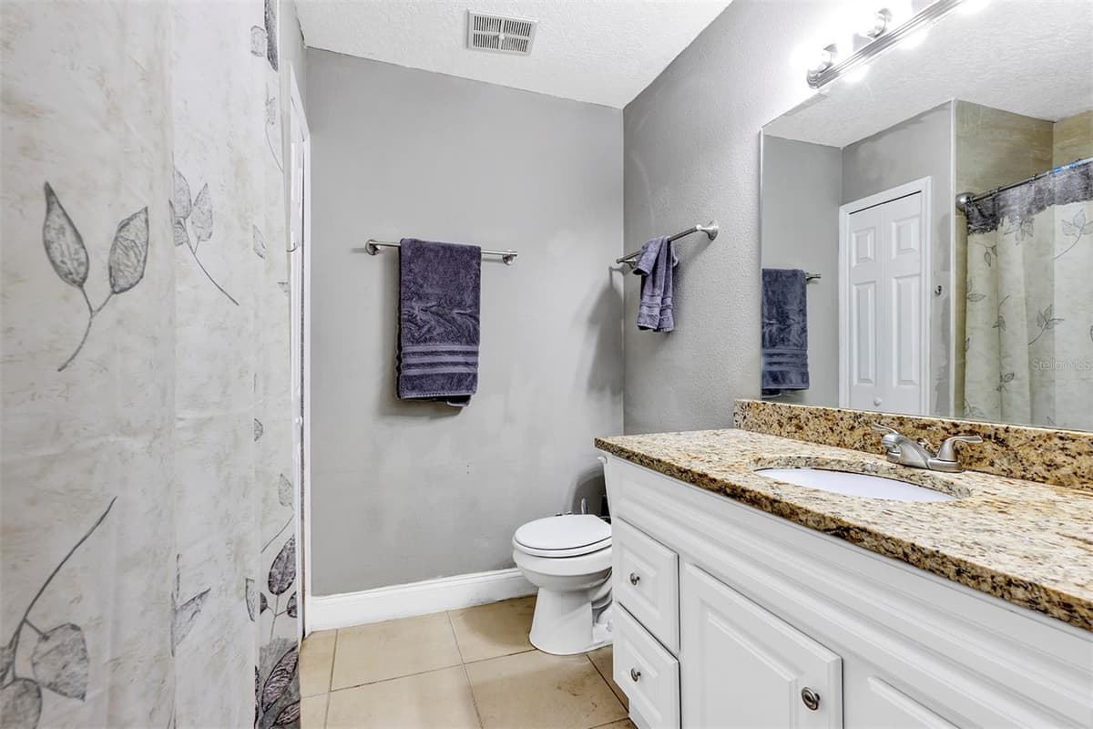 6906 COLONY OAKS LANE — photo 15 of 24