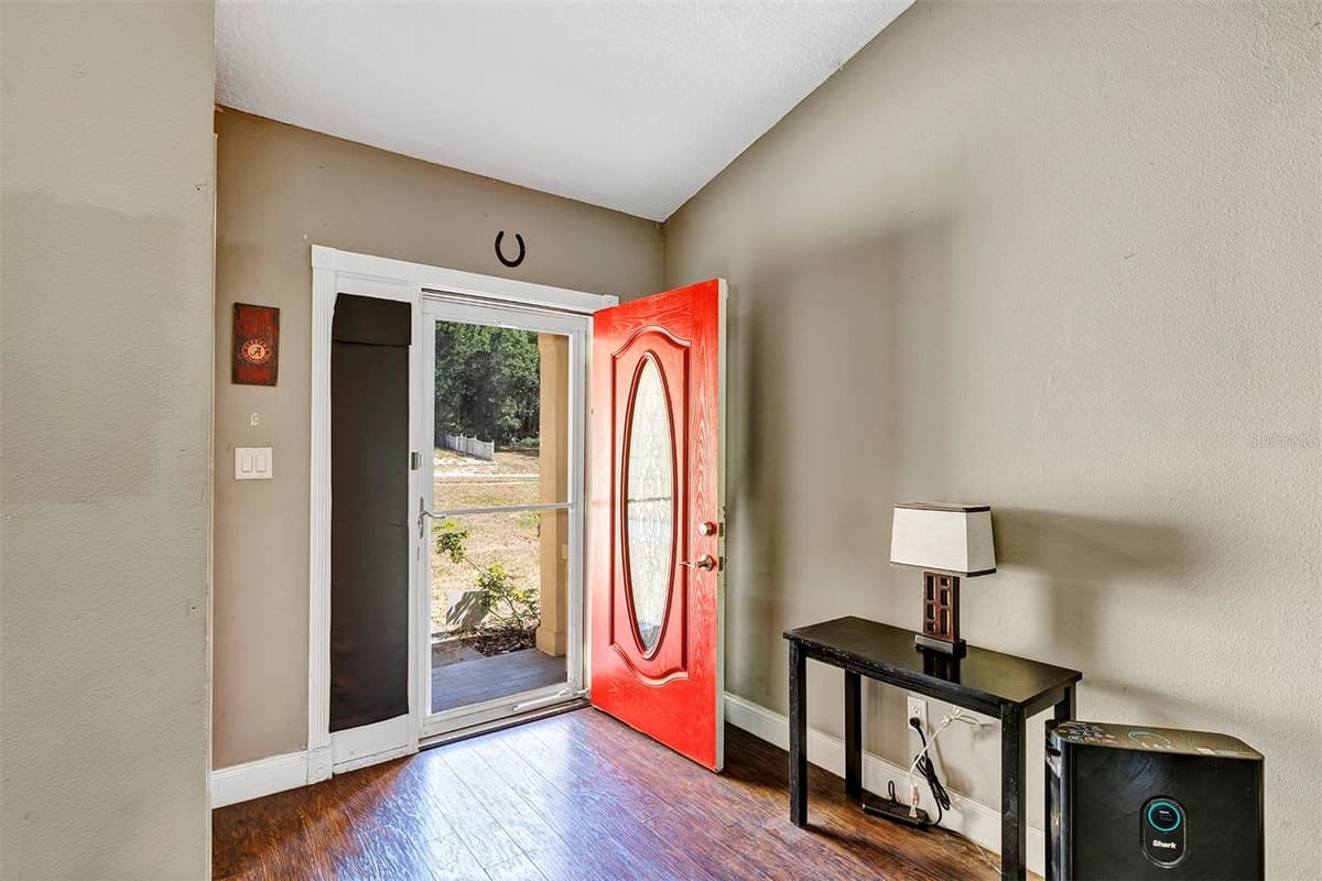 6906 COLONY OAKS LANE — photo 4 of 24