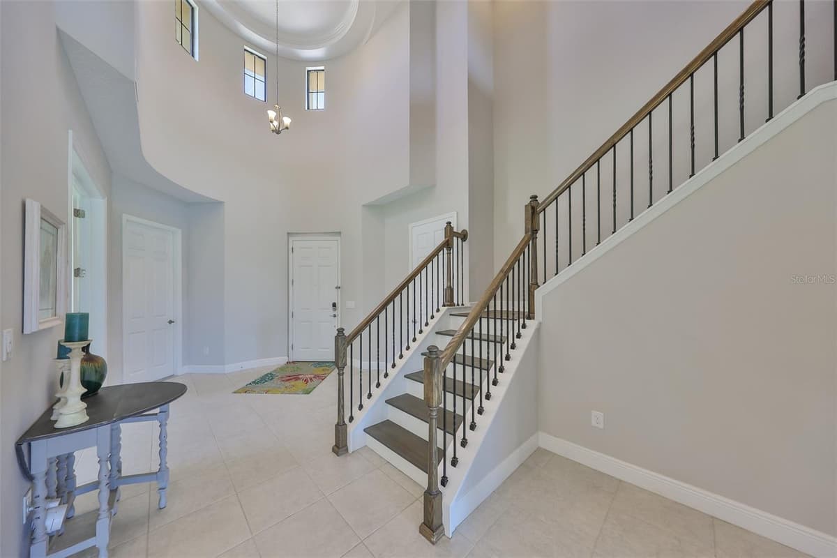 11909 CLIMBING FERN AVENUE — photo 4 of 78