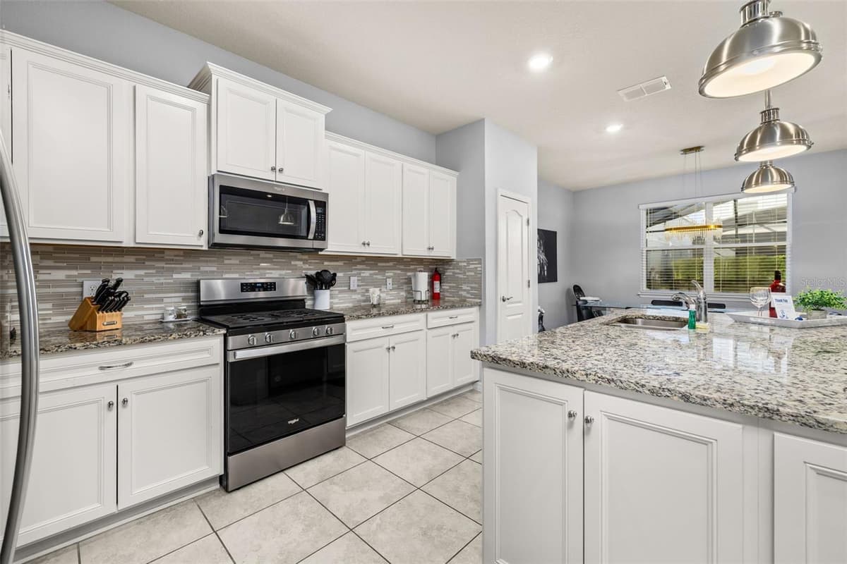 7184 OAKMOSS LOOP — photo 9 of 92