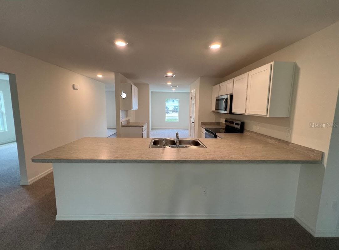 76 RALEIGH DRIVE — photo 3 of 9