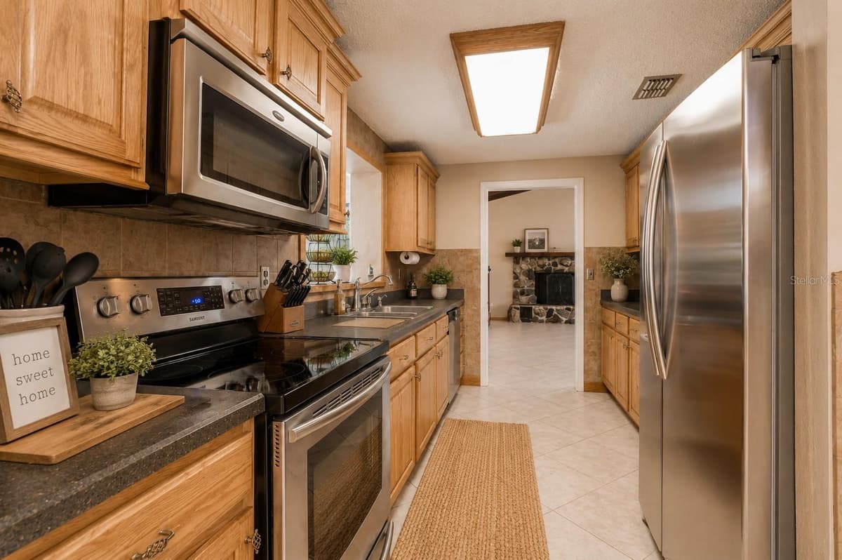 12311 OAKWOOD DRIVE — photo 8 of 59
