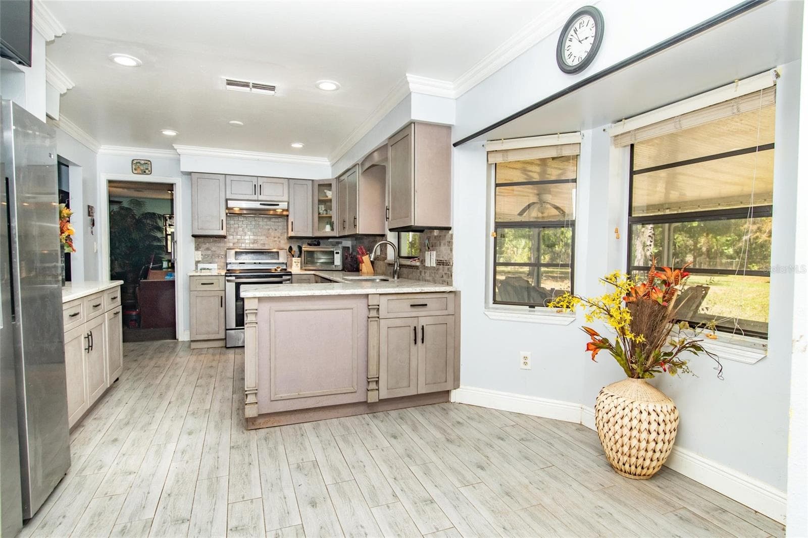 4022 CANAVERAL GROVES BOULEVARD — photo 5 of 50
