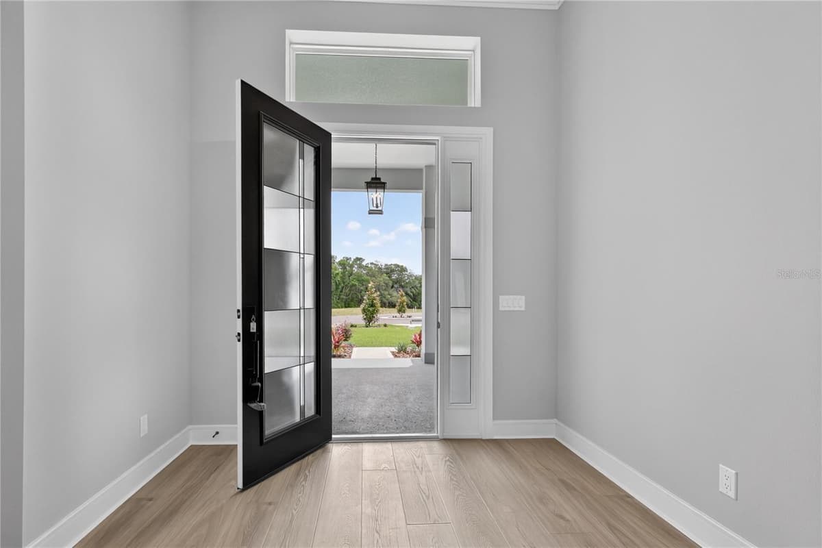 3836 SADDLE HILL TRAIL — photo 4 of 54