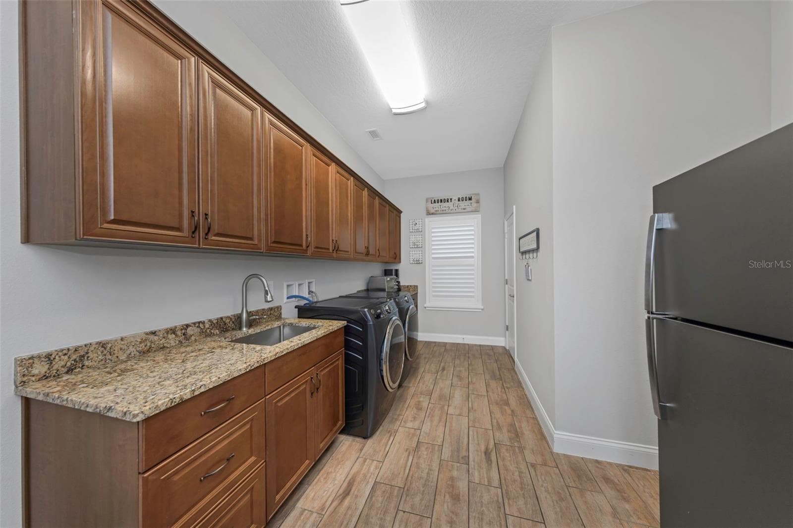 4042 WOODLAND RETREAT BOULEVARD — photo 76 of 93