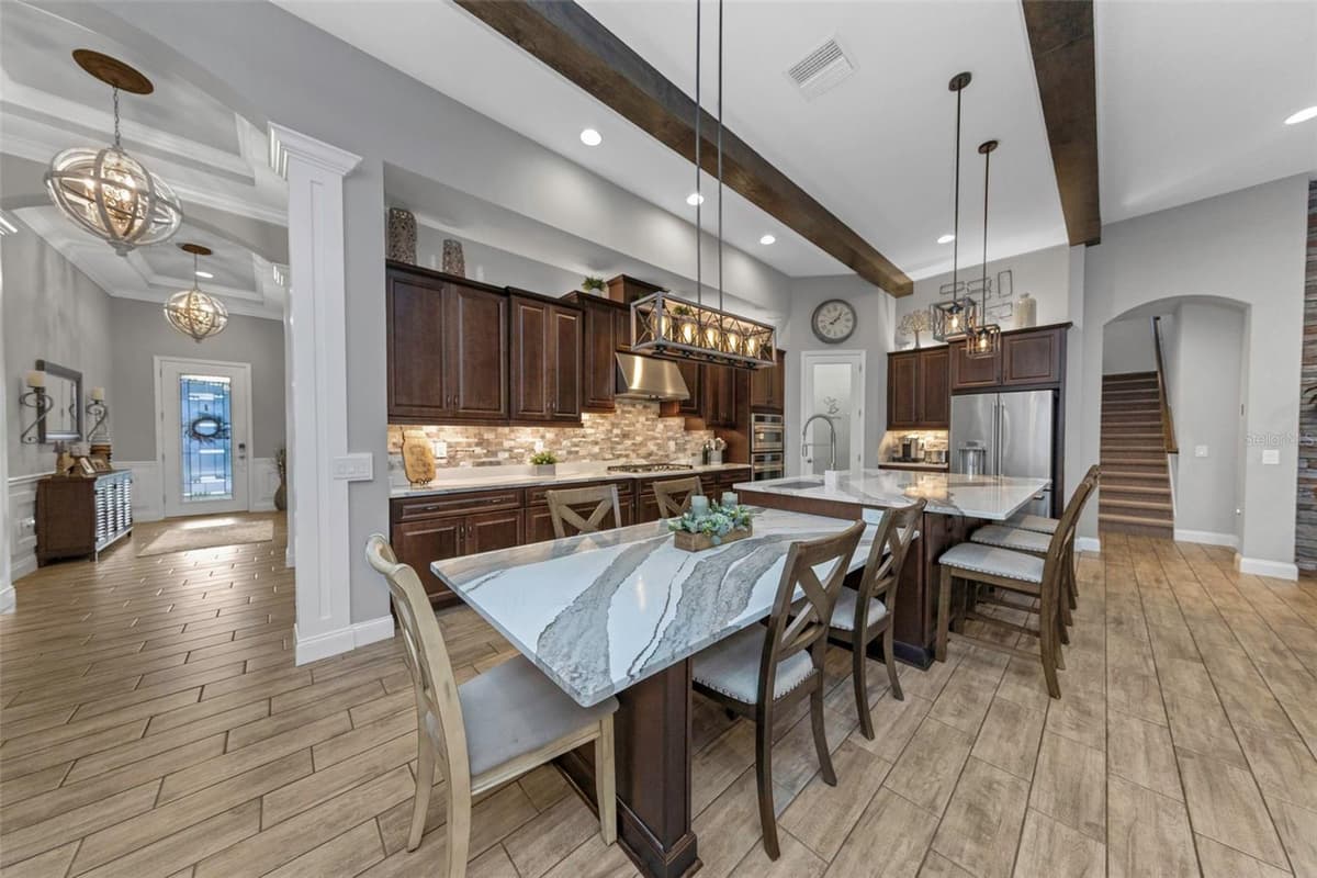 4042 WOODLAND RETREAT BOULEVARD — photo 7 of 93