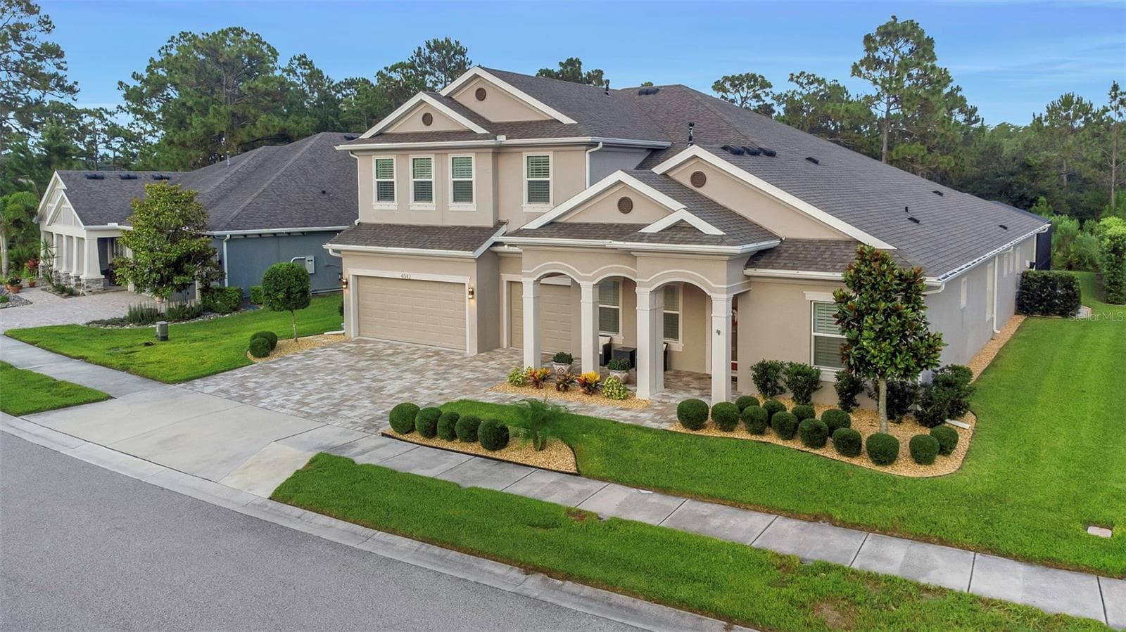 4042 WOODLAND RETREAT BOULEVARD — photo 2 of 93