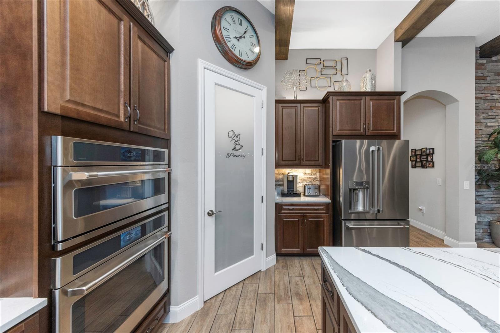4042 WOODLAND RETREAT BOULEVARD — photo 10 of 93