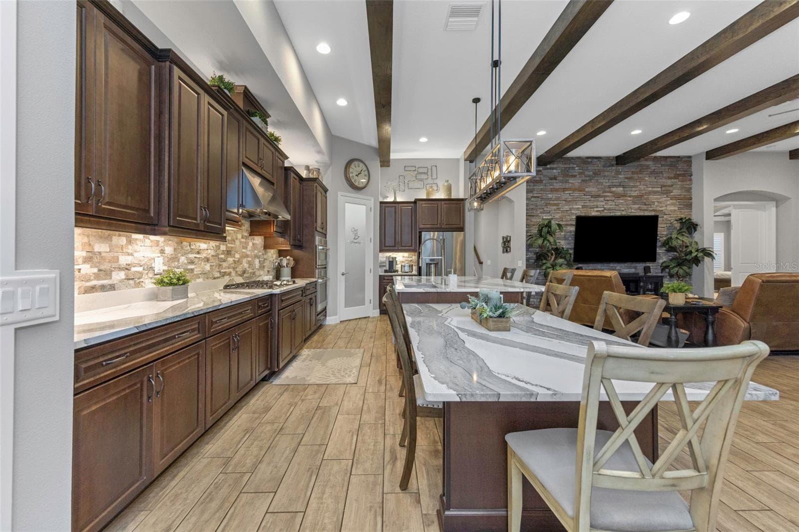 4042 WOODLAND RETREAT BOULEVARD — photo 8 of 93