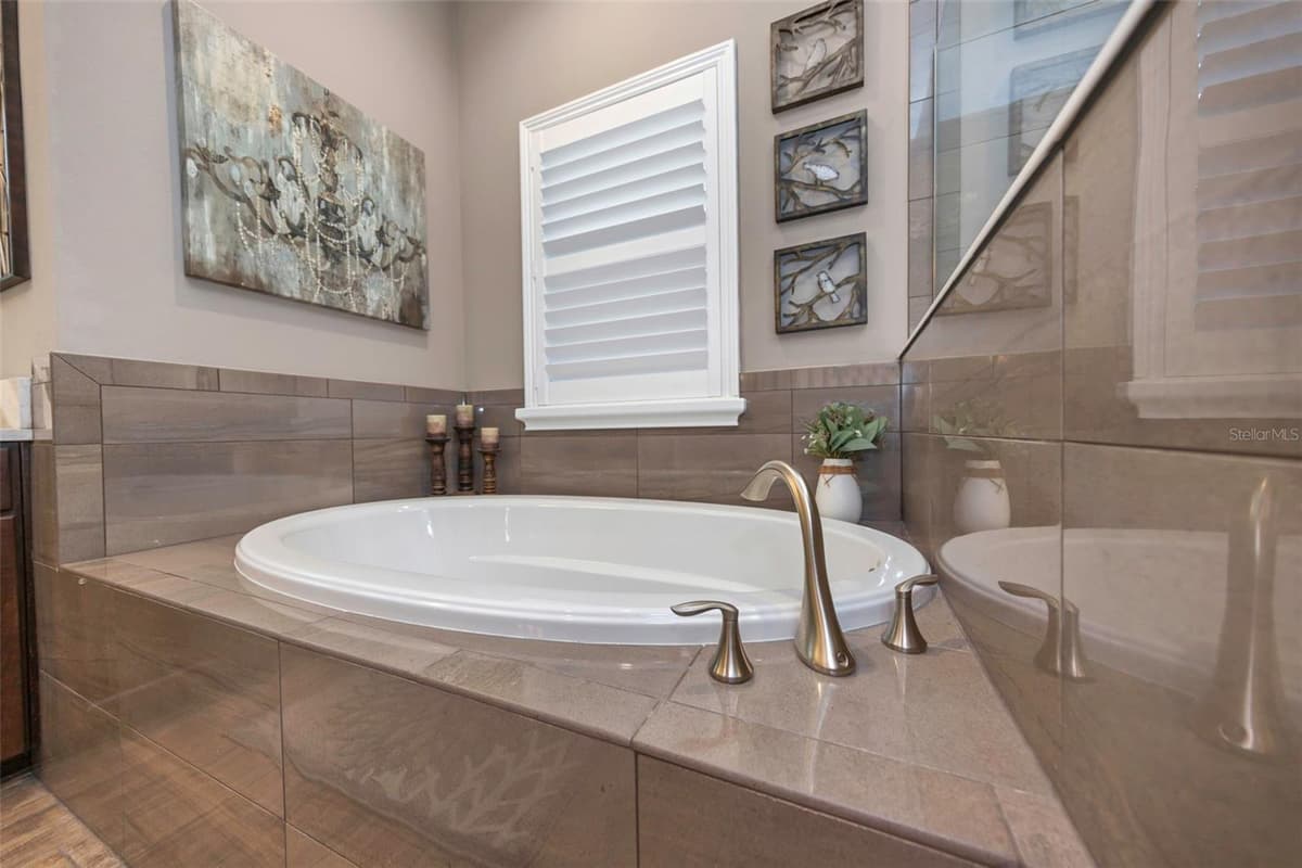 4042 WOODLAND RETREAT BOULEVARD — photo 60 of 93