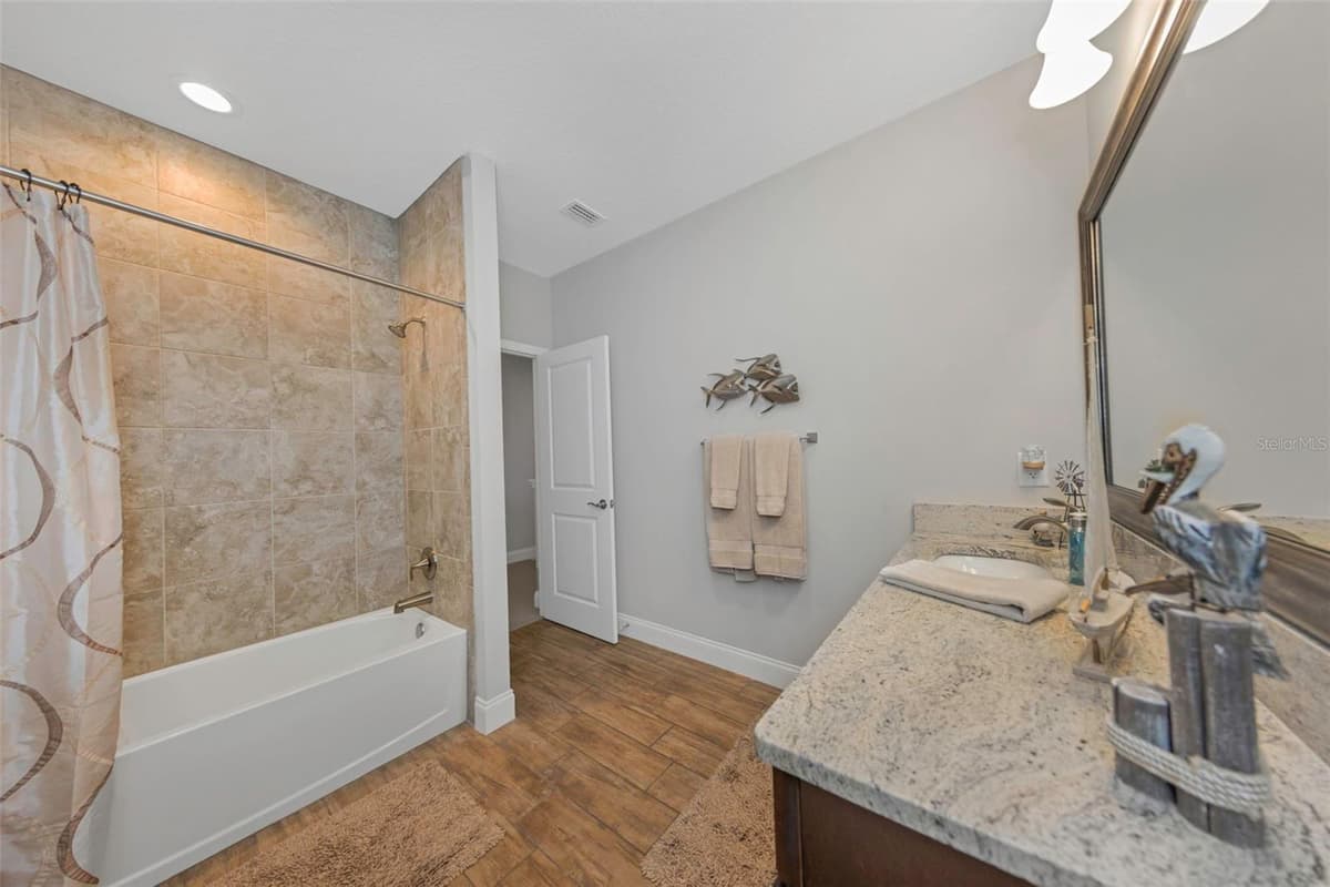 4042 WOODLAND RETREAT BOULEVARD — photo 68 of 93