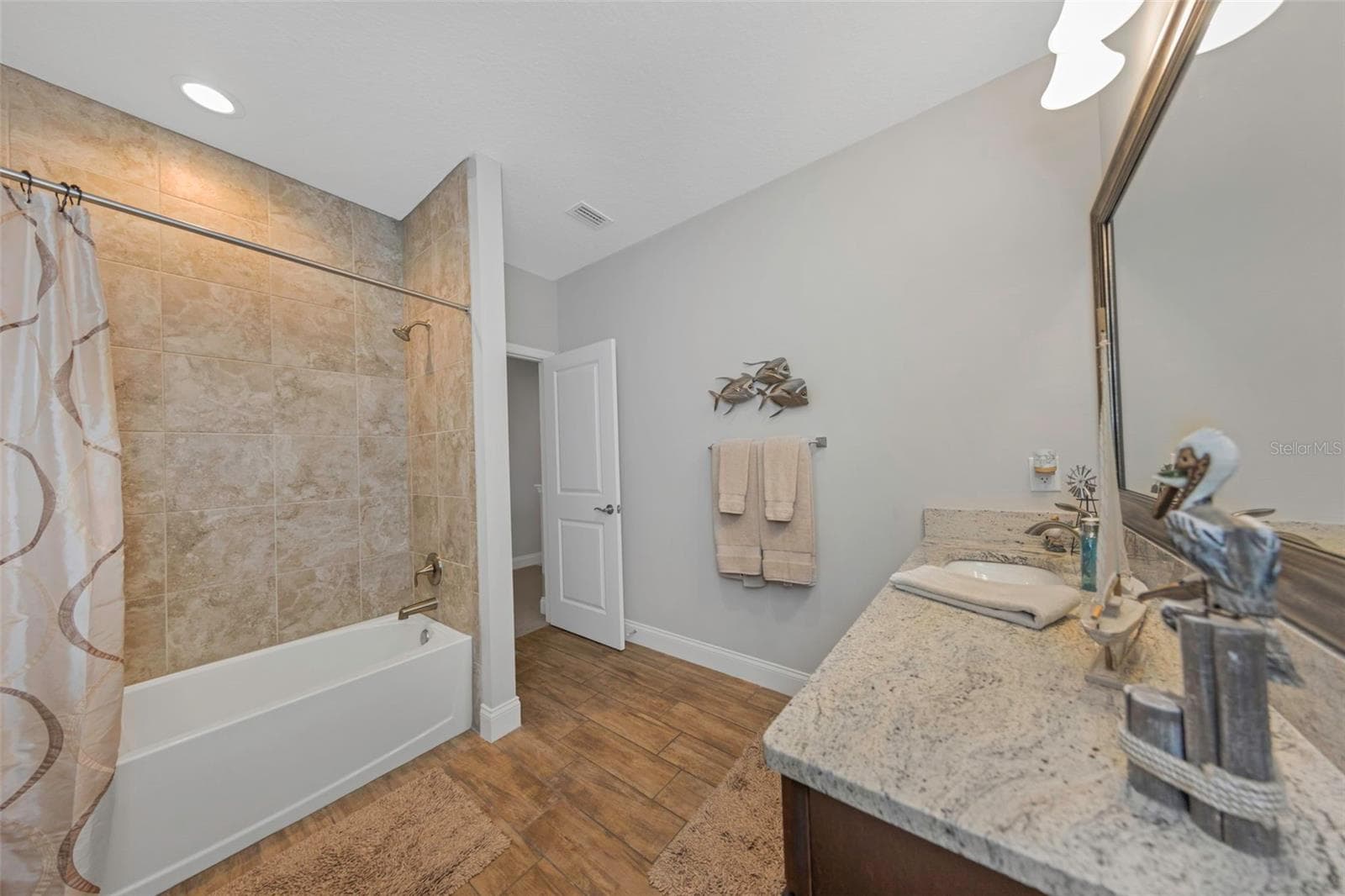 4042 WOODLAND RETREAT BOULEVARD — photo 68 of 93