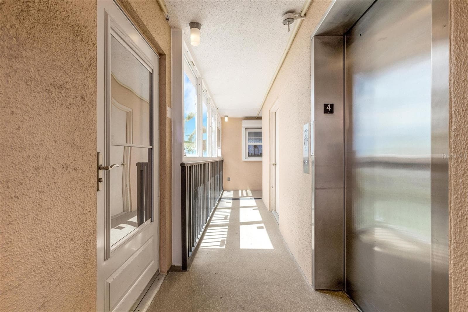 7665 SUN ISLAND DRIVE — photo 3 of 43