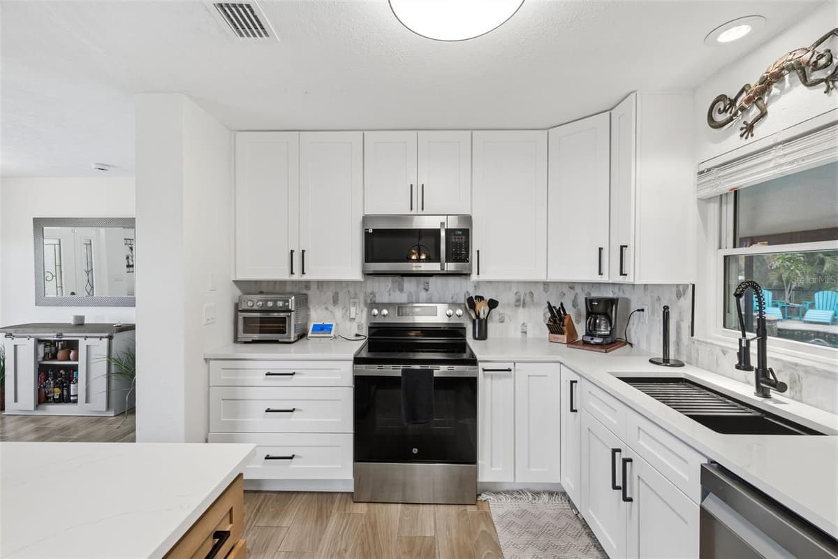 9910 PENINSULAR DRIVE — photo 15 of 67
