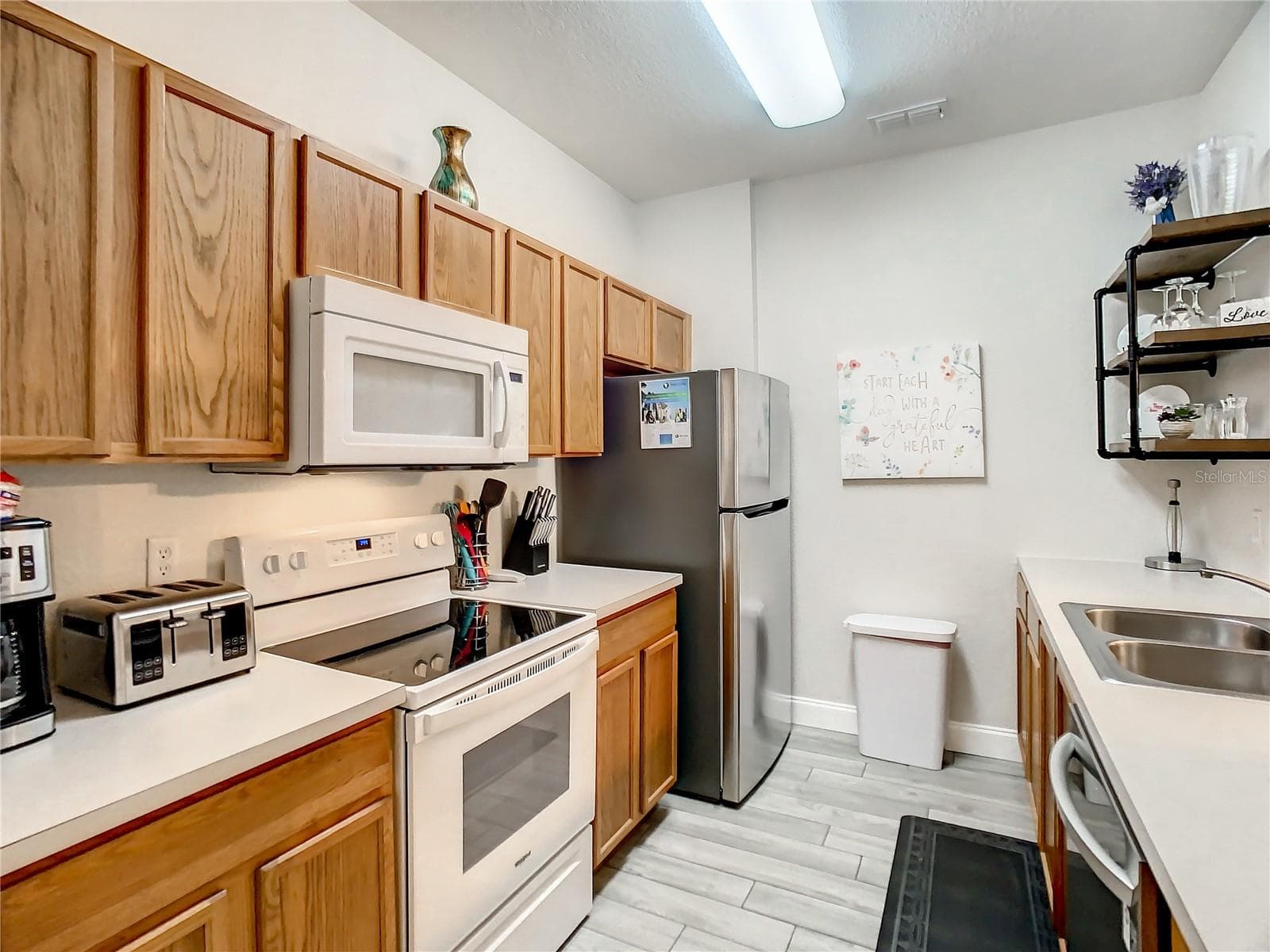 7664 COMROW STREET — photo 7 of 68