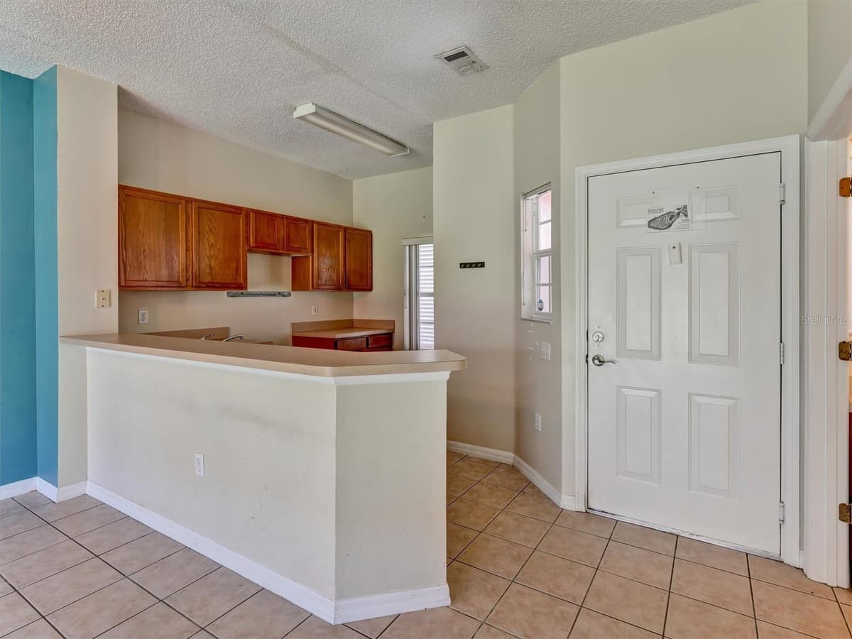 8407 BLUE LAGOON DRIVE — photo 5 of 28