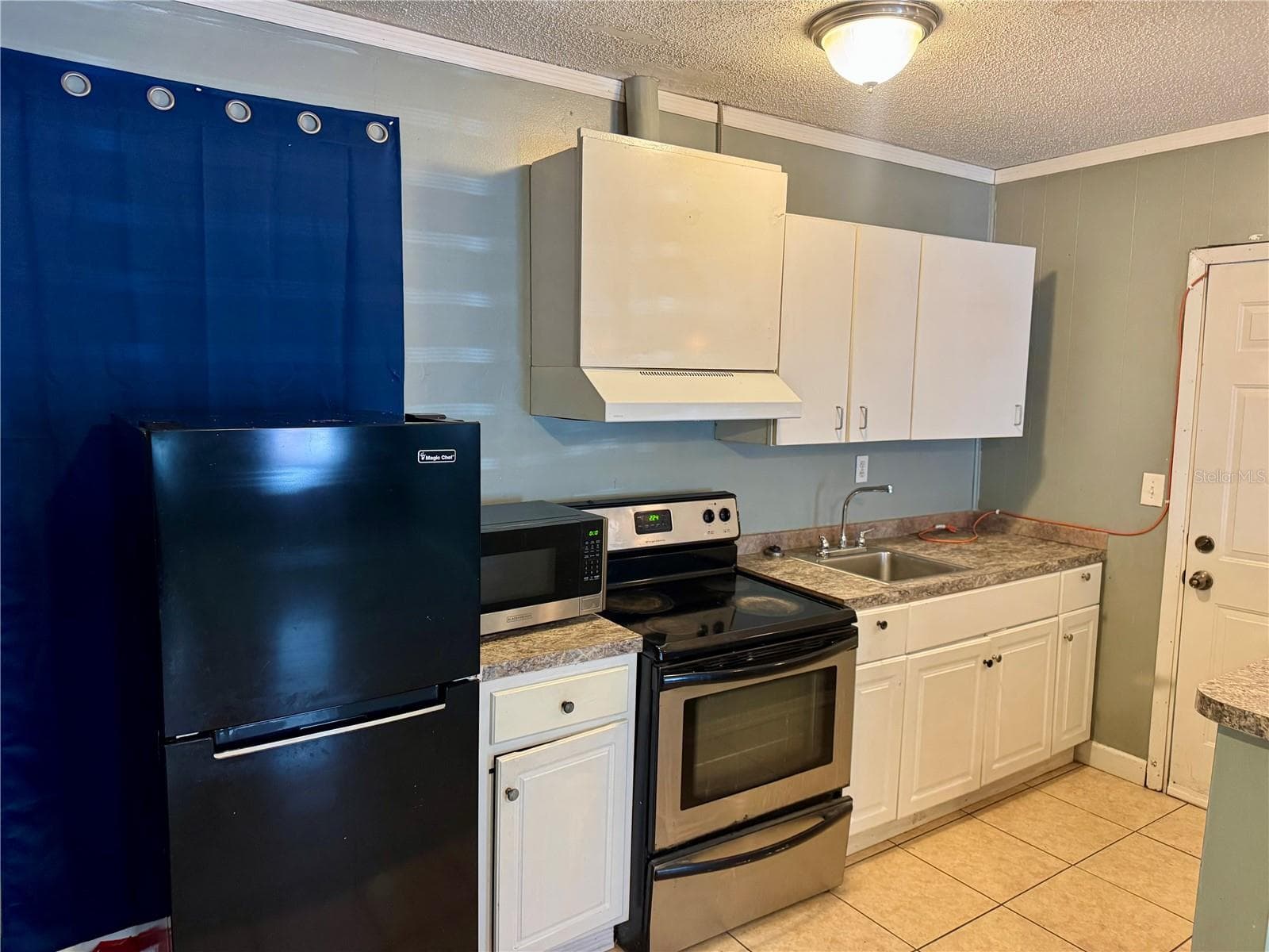 5521 AXIOM AVENUE — photo 6 of 13