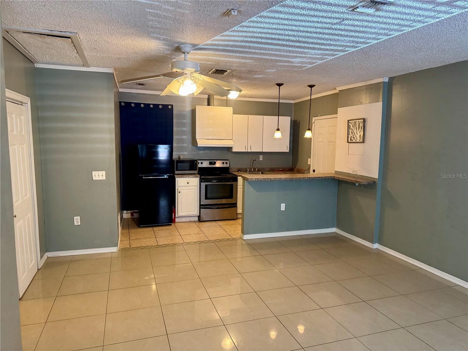 5521 AXIOM AVENUE — photo 4 of 13