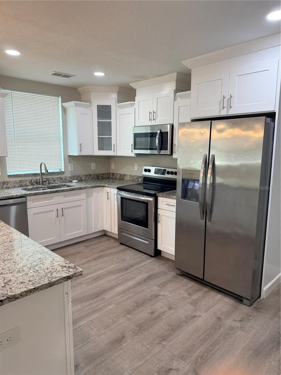 1002 BOUGAINVILLEA AVENUE — photo 11 of 28