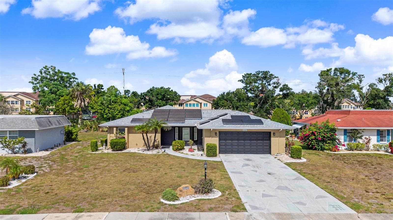 1242 DEL WEBB BOULEVARD — photo 1 of 43